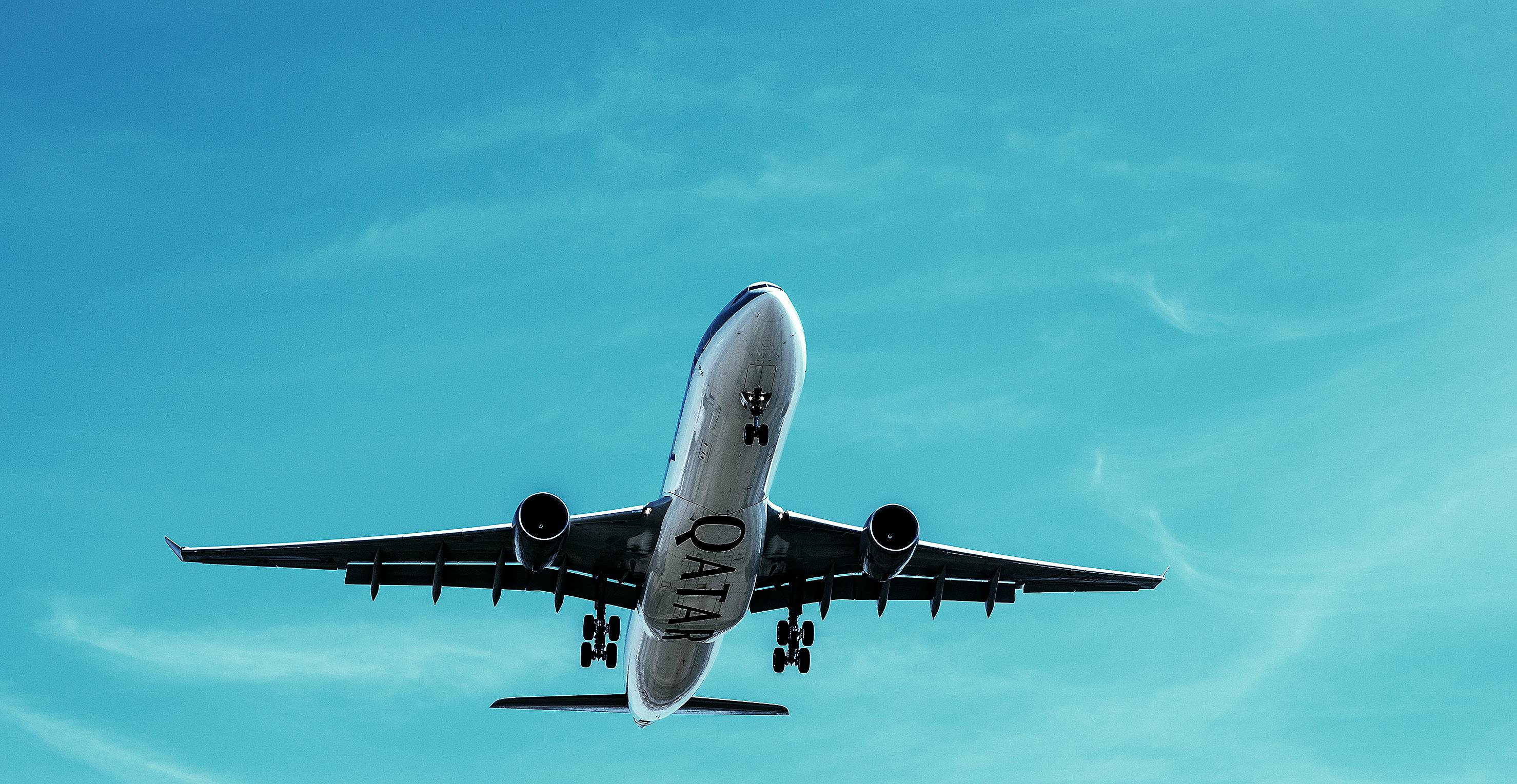 Airplane flying over sea